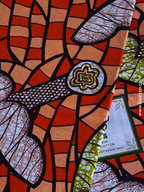 Pagne wax orange & pêche à motifs fleurs